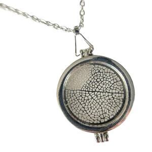 lbvyr convertible necklace with 3 floral/plant themed discs